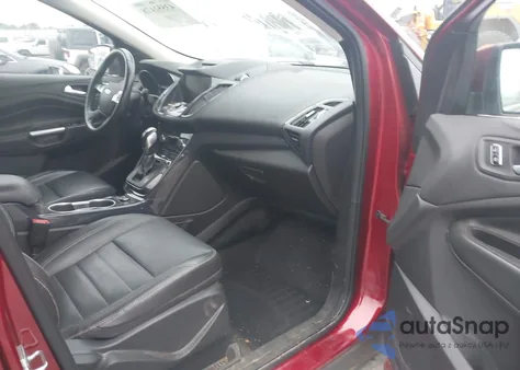 2014 Ford Escape Titanium z USA, uszkodzony, nr VIN 1FMCU0J93EUE07322